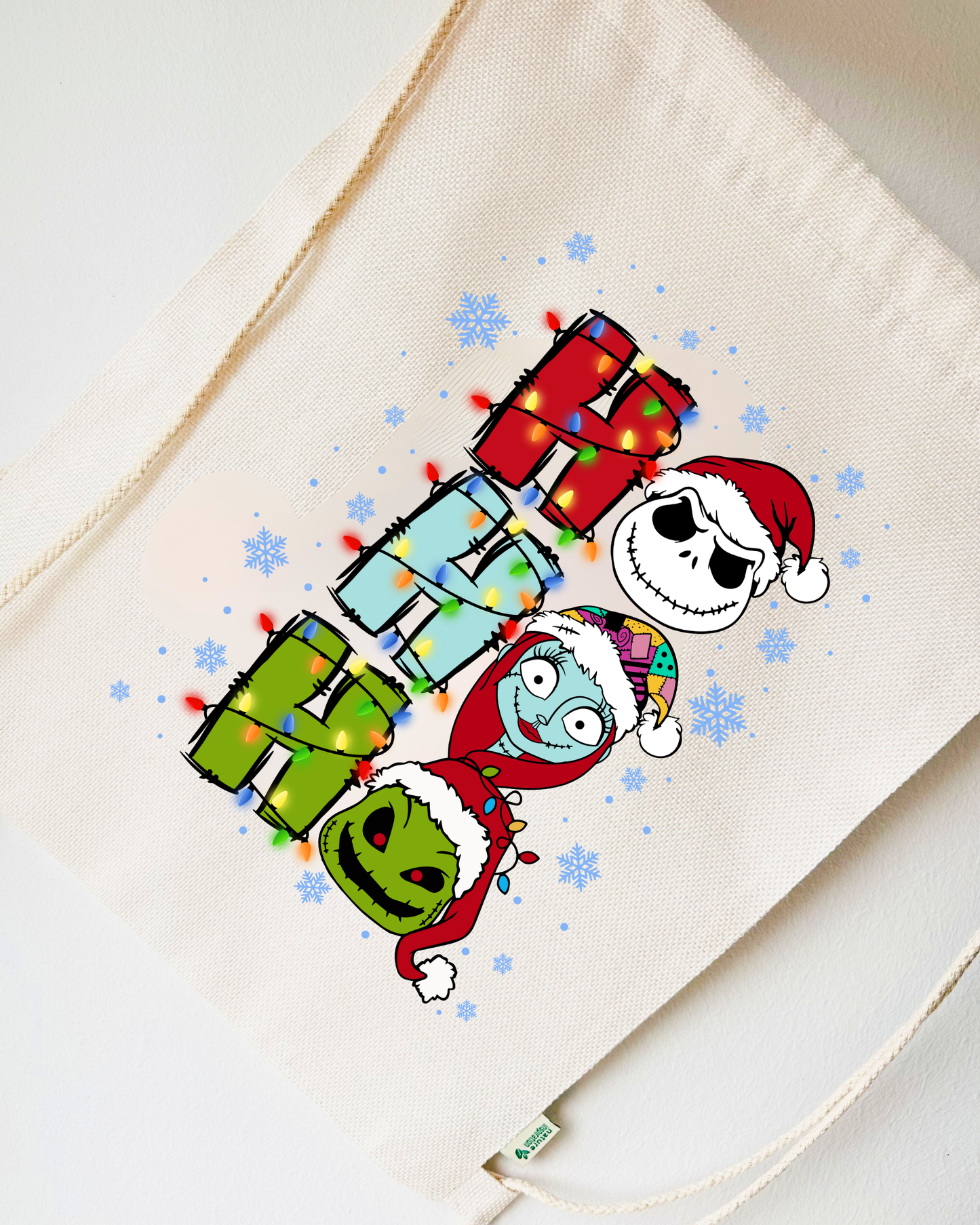 Tote Bag o Mochila Navideña “Ho Ho Ho” edición Pesadilla Antes de Navidad