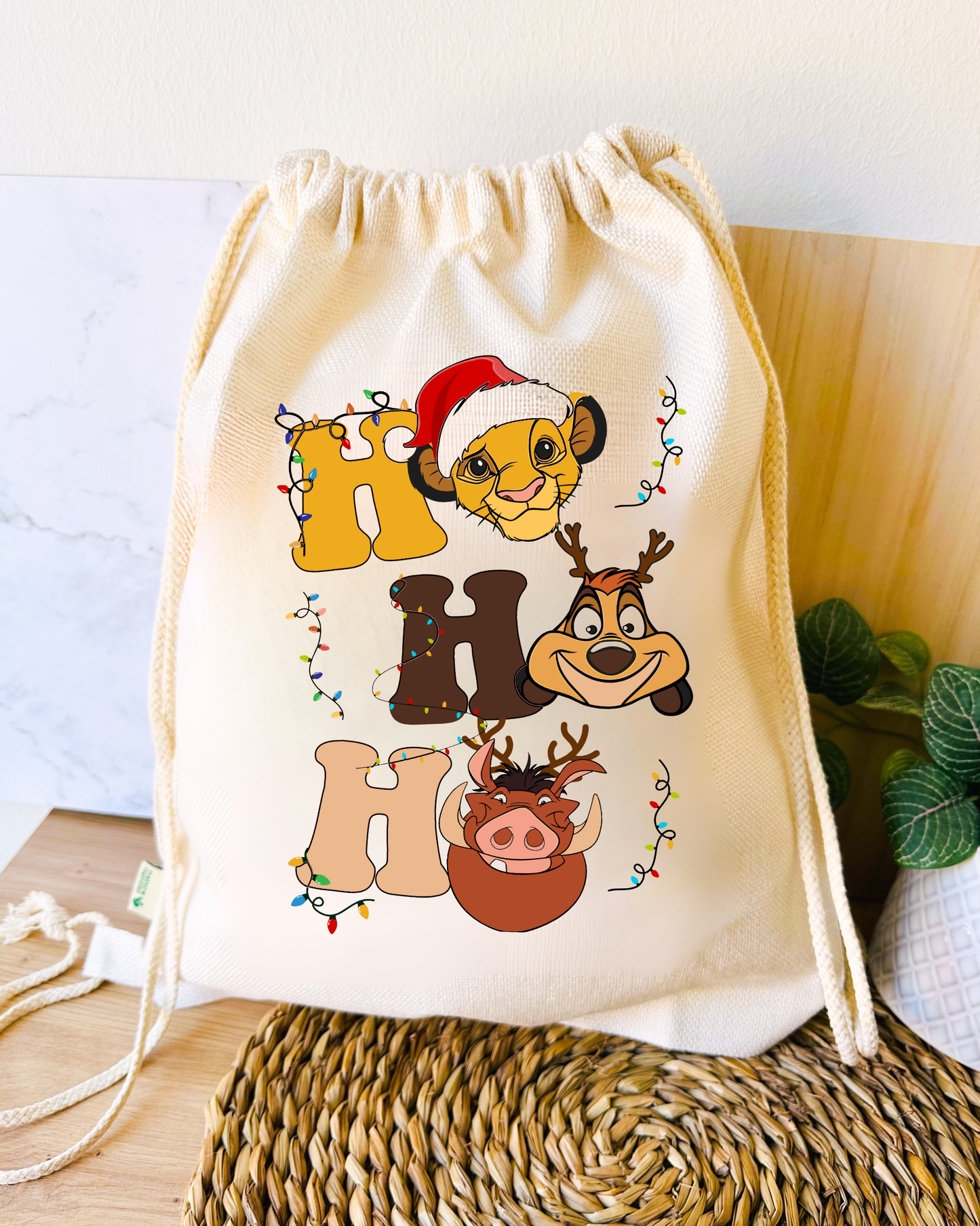 Tote Bag o Mochila Navideña “Ho Ho Ho” edición Rey León